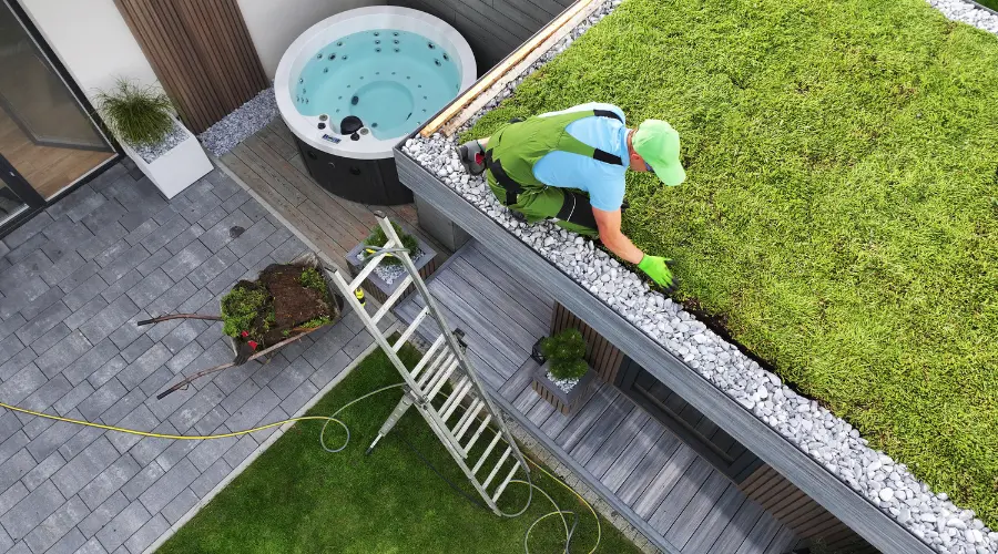 the man cleaning the roof top